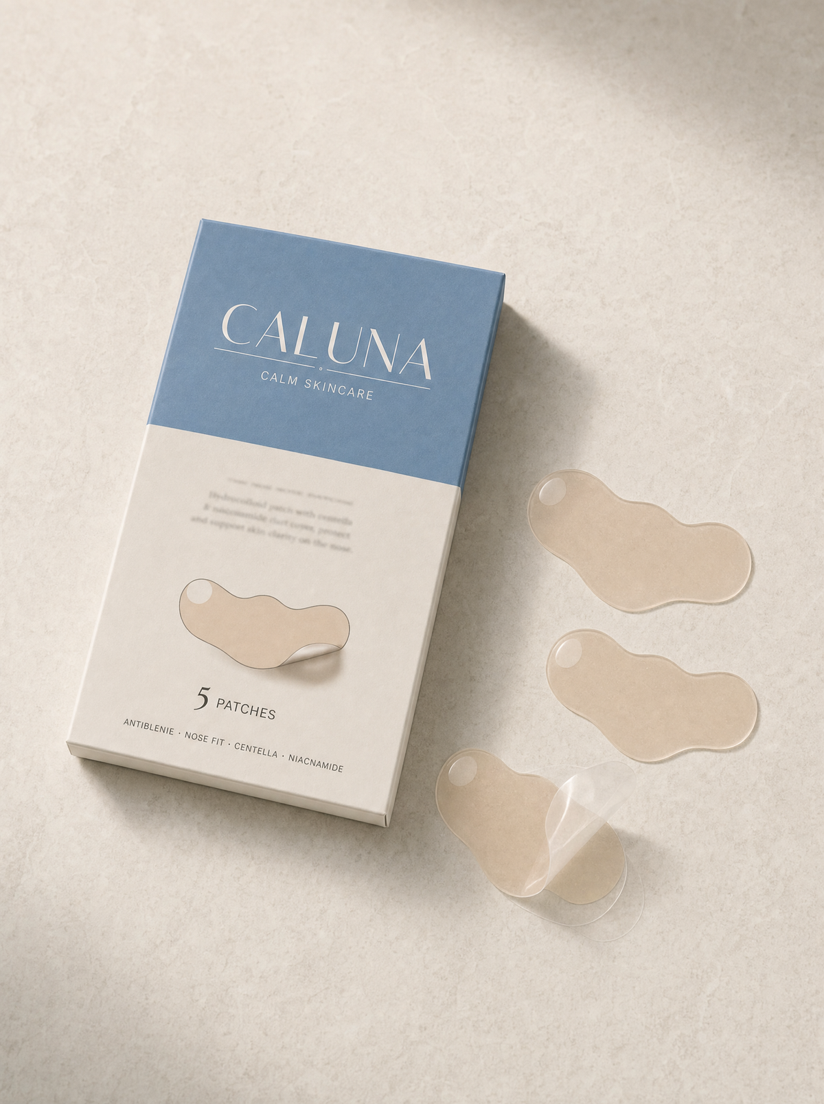The Nose Patch box flat-lay with three loose nose-shaped hydrocolloid patches